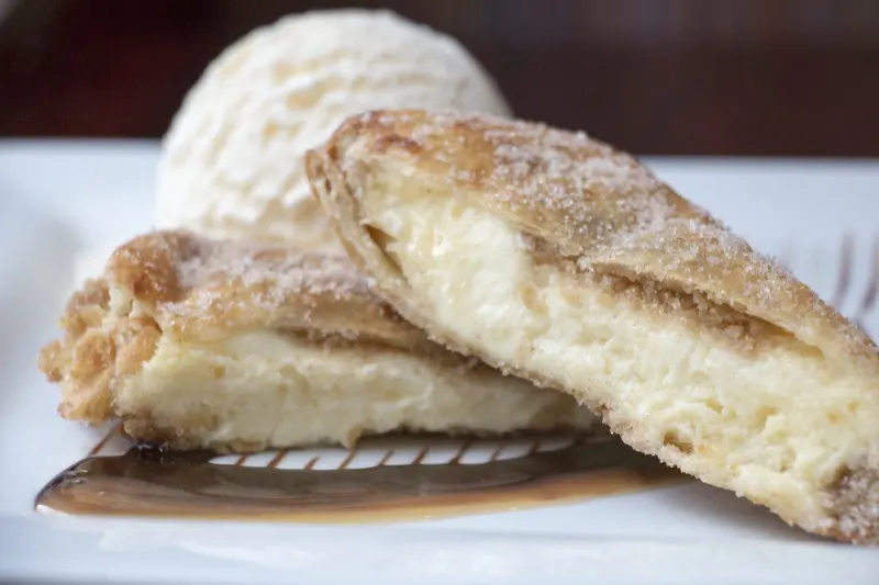 Cheesecake dessert burrito with ice cream and caramel